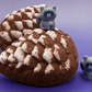 Snow Dusted Pine Cone Bath Bomb for Kids with Raccoon Figure Inside