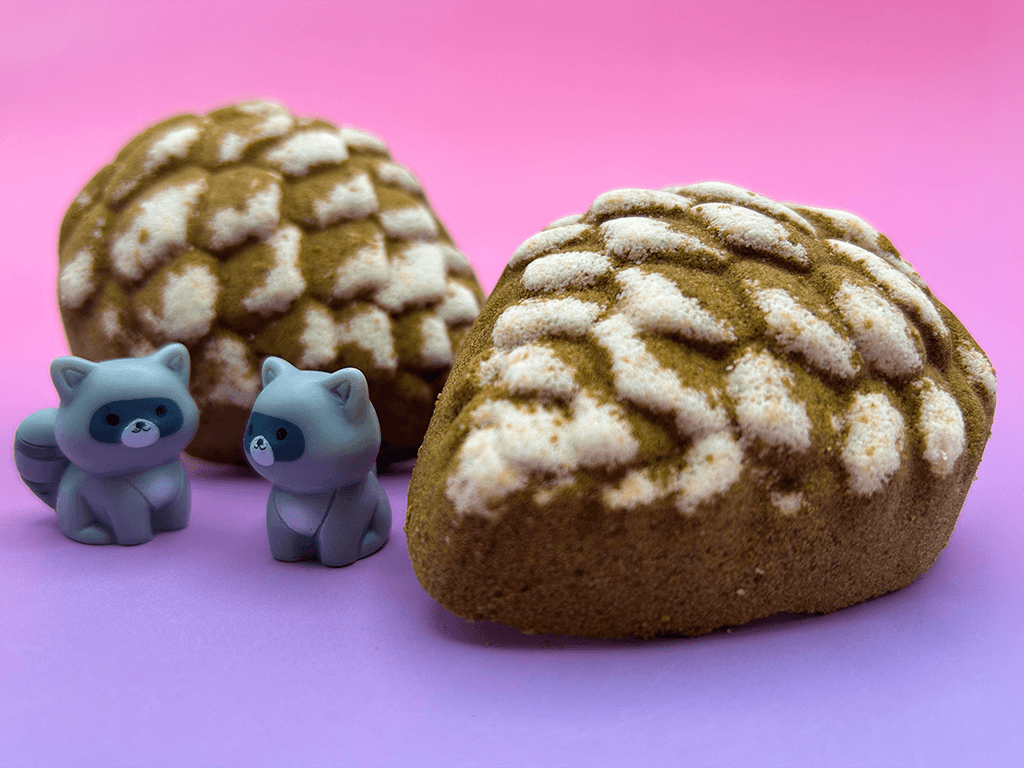 Snow Dusted Pine Cone Bath Bomb for Kids with Raccoon Figure Inside