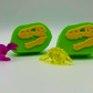 Dinosaur Fossil Kids Bath Bomb with Crystal Dinosaur Figure Inside - Berwyn Betty's Bath & Body Shop