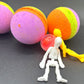 💀 Halloween Striped Kids Bath Bomb with Stretchy Skeleton Inside - Berwyn Betty's Bath & Body Shop