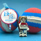 HARLEQUIN Kids Bath Bomb with Harlequin Minifigure Toy - Limited Edition - Berwyn Betty's Bath & Body Shop