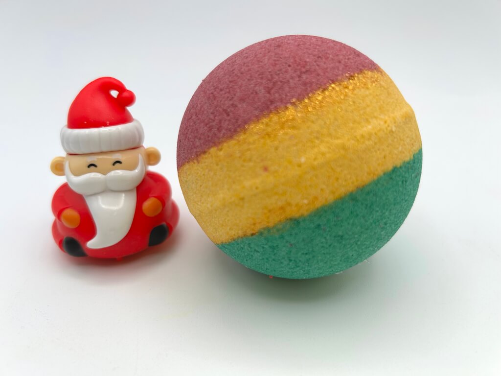 Holiday Kids Bath Bomb with Holiday Figure Pullback Racer Inside - Maroon/Gold/Green - Berwyn Betty's Bath & Body Shop