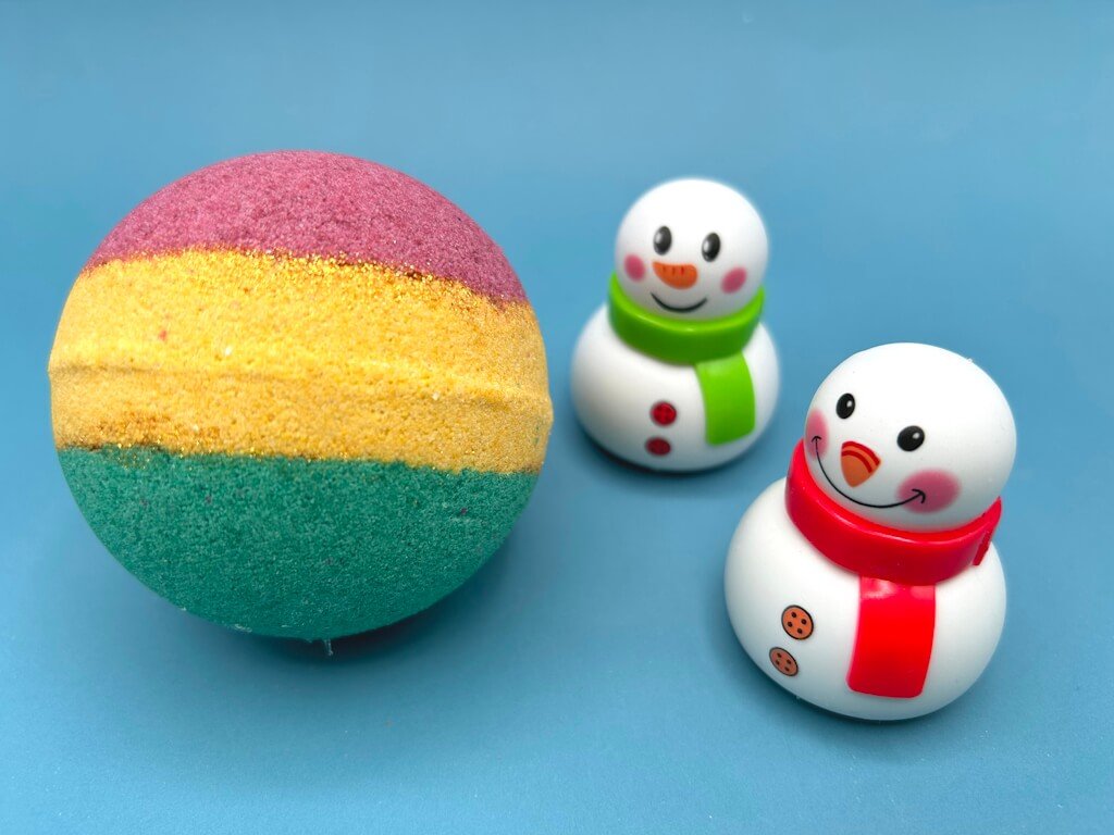 Holiday Kids Bath Bomb with Holiday Figure Pullback Racer Inside - Maroon/Gold/Green - Berwyn Betty's Bath & Body Shop