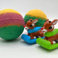 Holiday Kids Bath Bomb with Reindeer Racer Inside - Maroon/Gold/Green - Berwyn Betty's Bath & Body Shop