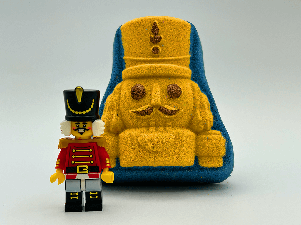 Nutcracker Sugar Cookie Kids Bath Bomb with Nutcracker Minifigure Inside - Berwyn Betty's Bath & Body Shop
