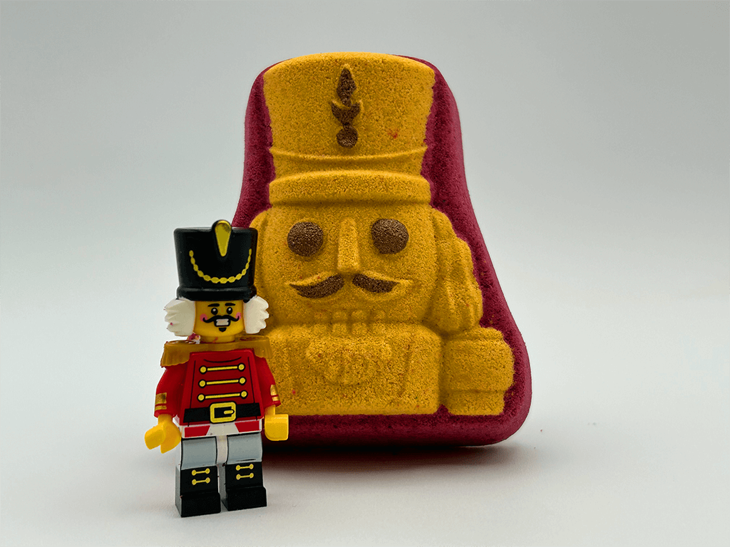 Nutcracker Sugar Cookie Kids Bath Bomb with Nutcracker Minifigure Inside - Berwyn Betty's Bath & Body Shop