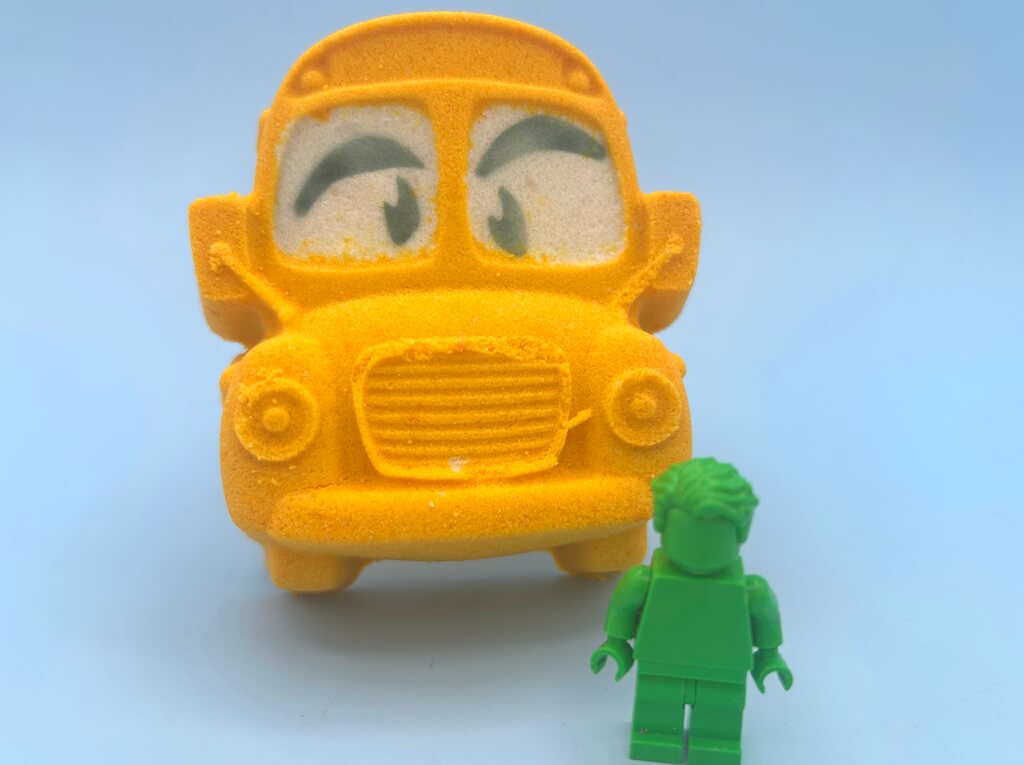 School Bus Bath Bomb with Minifigure Student Inside - Berwyn Betty's Bath & Body Shop