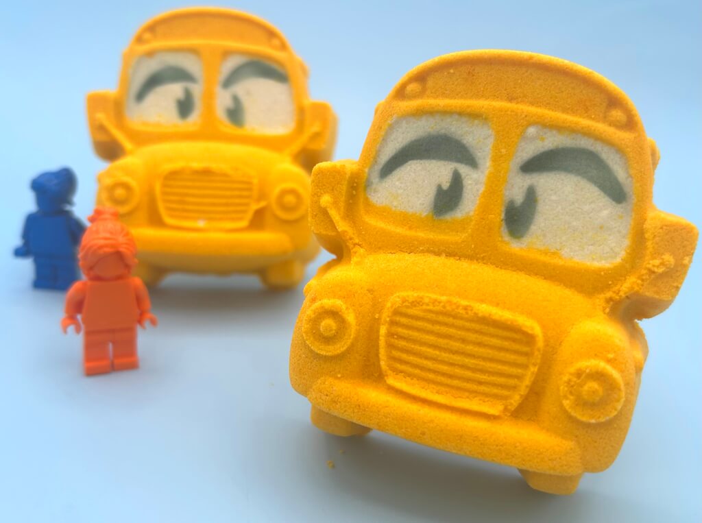 School Bus Bath Bomb with Minifigure Student Inside - Berwyn Betty's Bath & Body Shop