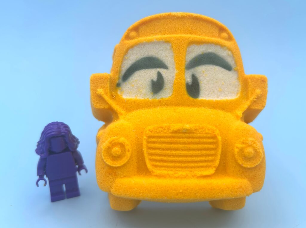 School Bus Bath Bomb with Minifigure Student Inside - Berwyn Betty's Bath & Body Shop