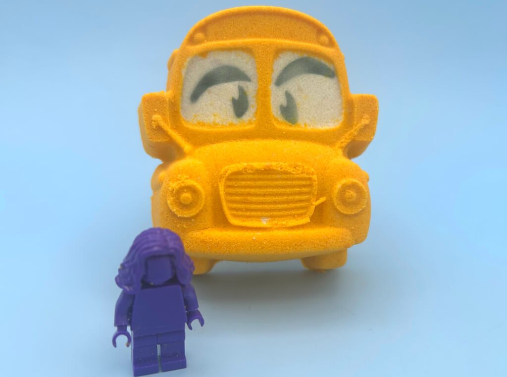 School Bus Bath Bomb with Minifigure Student Inside - Berwyn Betty's Bath & Body Shop